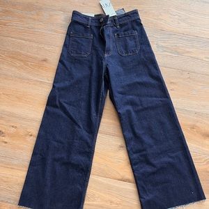 Brand New. ZARA Patch Pocket jeans in Rinse.High waisted.Wideleg.Raw Hem.